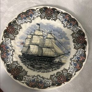 Blue and White Decorative Plate with Ornate Accents
